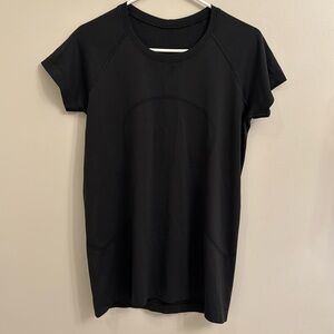 Lululemon swiftly tech shirt in black; size 10; perfect condition